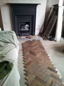 2. Laying the central section - DIY Reclaimed Parquet Flooring Installation